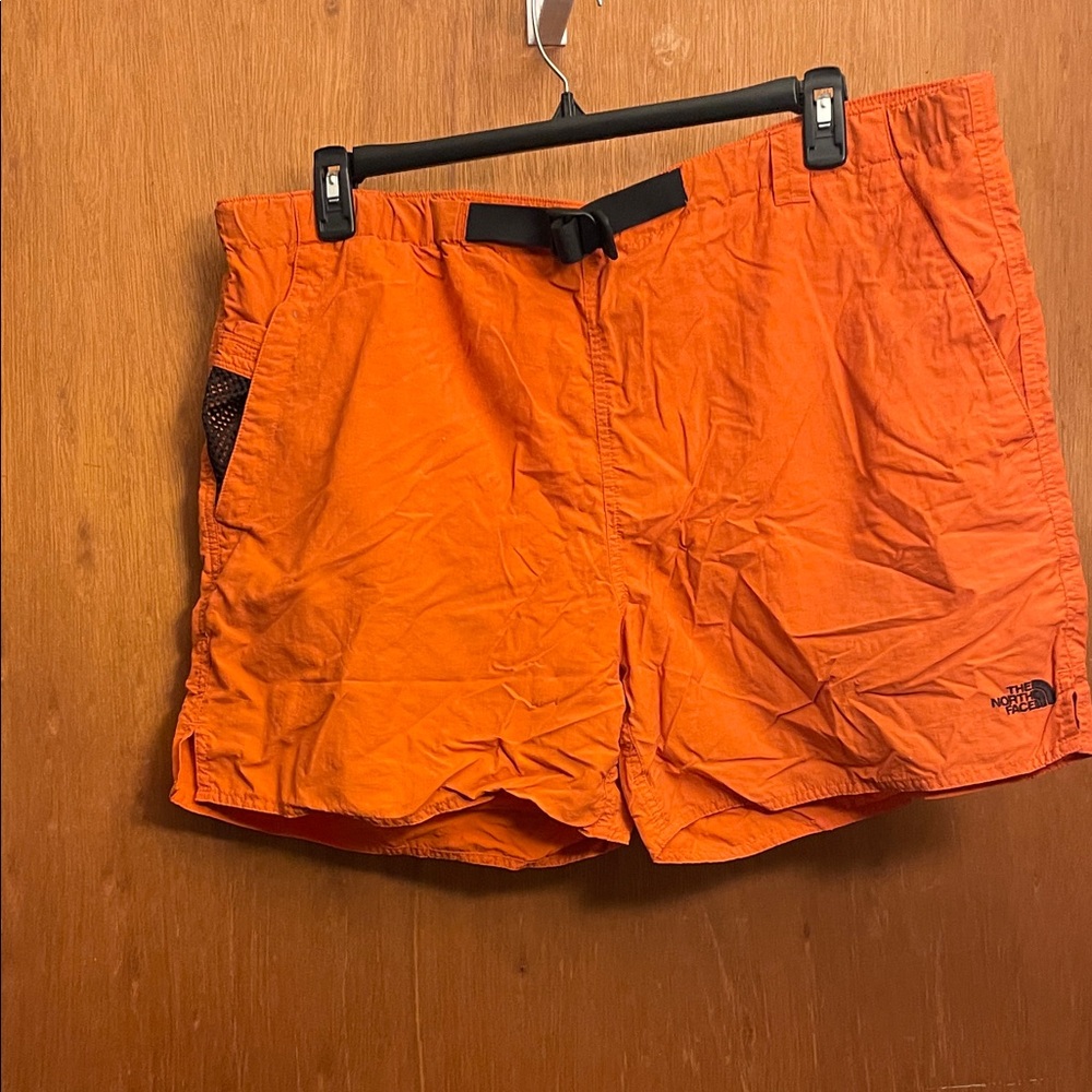 The North Face Vibrant Orange Shorts with Black Accent
